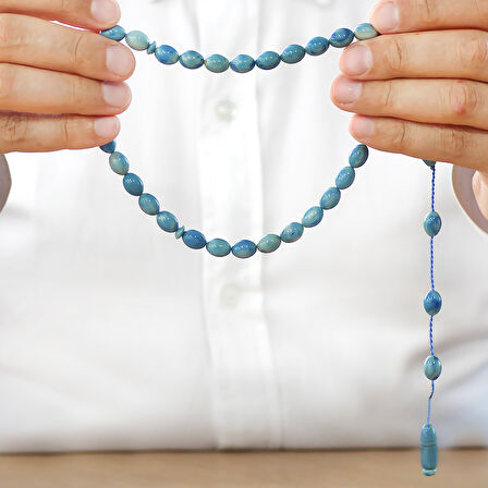 Sistemli Arpa Kesim Turkuaz-Mavi Sıkma Kehribar Tesbih