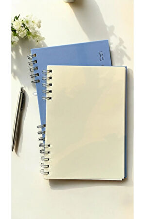 The Notebook Serisi Spiralli 80 Yaprak Çizgisiz A5 Defter (PLACID BLUE KAPAK)