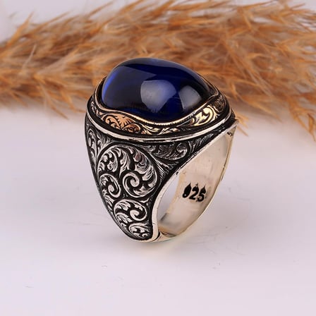 KALEM İŞLEME MOTİFLİ OVAL MODEL ZİRKON TAŞLI GÜMÜŞ YÜZÜK