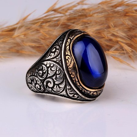 KALEM İŞLEME MOTİFLİ OVAL MODEL ZİRKON TAŞLI GÜMÜŞ YÜZÜK