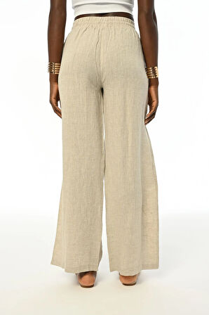 KADIN RAHAT KALIP BOL PAÇA BELİ LASTİKLİ TAŞ İŞLEMELİ NATUR PANTOLON