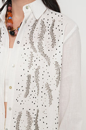 KADIN ÖNÜ BONCUKLU OVERSİZE KESİM DÜZ RENK GÖMLEK