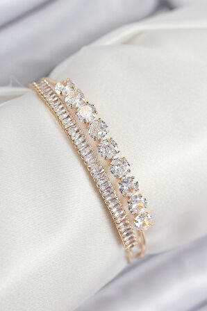 Pirinç Zirkon Taşlı Su Yolu Model Gold Renk Kadın Bileklik