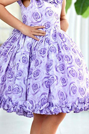 Kız Çocuk Yakası ve Etek Ucu Fırfırlı Üzeri Gül Baskılı Kolsuz Lila Elbise