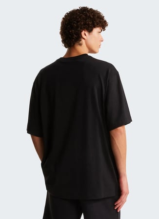 The North Face NF0A8G9UJK31-M LIQUID LOGO OVERSIZ Siyah Yuvarlak Yaka Regular Fit Düz Erkek T-Shirt