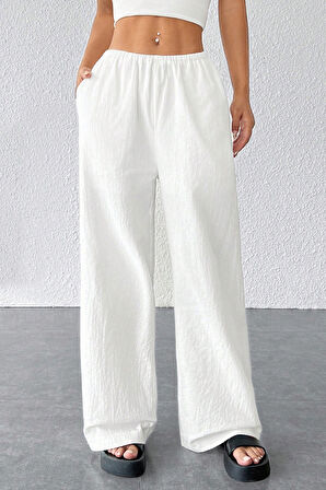 Dodes Kadın Beyaz Bol Kesim Cepli Geniş Paça Dökümlü Pantolon