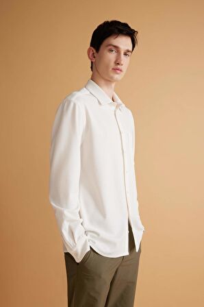 DeFacto Regular Fit Polo Yaka Krinkıl Basic Düz Uzun Kollu Beyaz Gömlek B6484AX24SPWT32