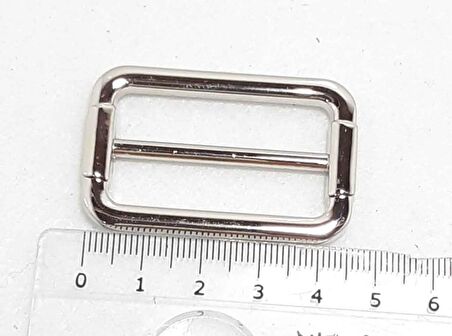 Gümüş renk  4x2  cm ayarlama aparatı .
