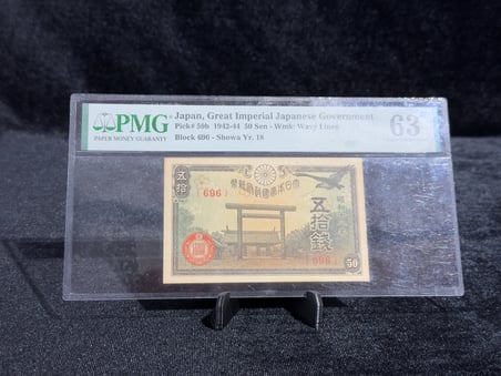 JAPONYA 1942–1944 – 50 SEN | PMG 63 CHOICE UNCIRCULATED | PICK#59b