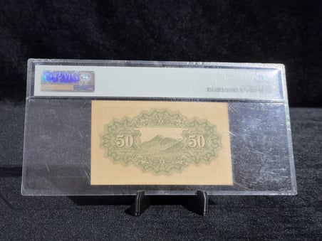 JAPONYA 1942–1944 – 50 SEN | PMG 63 CHOICE UNCIRCULATED | PICK#59b