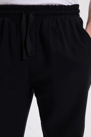 Erkek Baggy Fit Geniş Kesim %100 Pamuk Beli Lastikli Yandan Cepli Müslin Siyah Düz Pantolon
