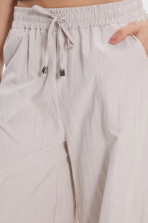Kadın Relax Fit Rahat Kesim Beli Bağcıklı Lastikli Yumuşak Dokulu Çift Cepli Bej Pantolon