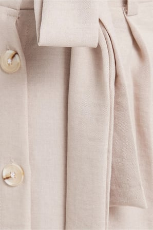 Kadın Slim Fit Dar Kesim Pileli Pamuklu Ön Düğme Kapamalı Kuşaklı Yırtmaçlı Taş Etek 