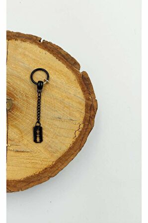 Çelik Figürlü Sallantılı Unısex Küpe