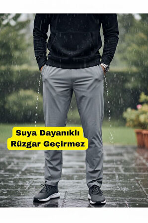 Erkek Füme Gri Rüzgar Geçirmez Suya Dayanıklı İçi Peluş Motorcu Eşofman Altı 22EESA5033