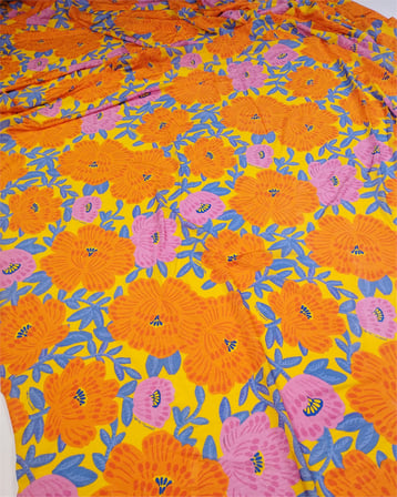 %85 Rayon %15 Elastan Sarı Üzeri Turuncu Pembe Mavi Çiçekli Sandy Jarse Benzeri Örme Kumaş Elbiselik & Bluzluk En: 130cm