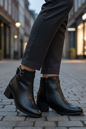 Siyah Cilt Fermuarlı Kaymaz Polarlı Kadın Topuklu Bot 417637 Z