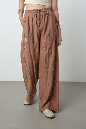 Kadın Önü Taş İşlemeli Düz Renk Beli Lastikli Bol Paça Pantolon