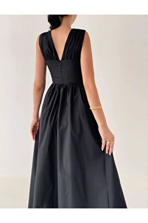 Büzgülü bel detaylı terikoton elbise