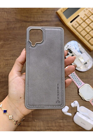 Samsung Galaxy A12 Uyumlu Premium Deri Dokulu Darbelere Karşı Dayanıklı Nazal Silikon Kılıf