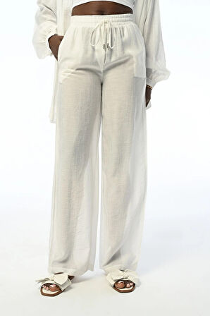 KADIN RAHAT KALIP BOL PAÇA  BELİ LASTİKLİ DÜZ RENK PANTOLON