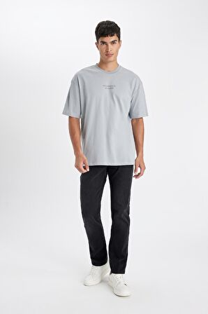 DeFacto Oversize Fit Bisiklet Yaka Sırt Baskılı Kısa Kollu Tişört D4909AX24AUGR130