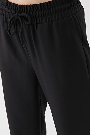 Beli Ve Paçası Lastikli Pantolon