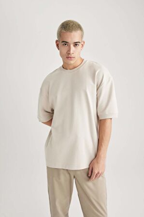 DeFacto Loose Fit Bisiklet Yaka Kısa Kollu Ağır Kumaş Basic Düz Tişört B4844AX24SPBG700
