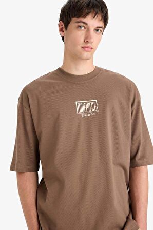 DeFacto %100 Pamuk One Piece Loose Fit Bisiklet Yaka Sırt Baskılı Kısa Kollu Tişört E0713AX25SMBN322