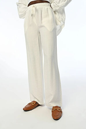 KADIN RAHAT KALIP BOL PAÇA BELİ LASTİKLİ DÜZ RENK PANTOLON