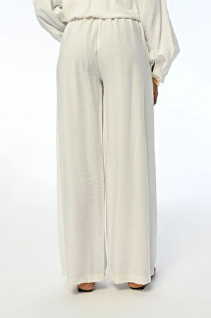 KADIN RAHAT KALIP BOL PAÇA BELİ LASTİKLİ DÜZ RENK PANTOLON