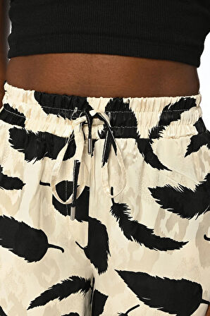 KADIN RAHAT KALIP BELİ LASTİKLİ YAPRAK DESENLİ JAKARLI PANTOLON