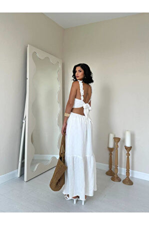 Kolu fırfırlı arkadan bağlama detaylı müslin  kumaş uzun elbise