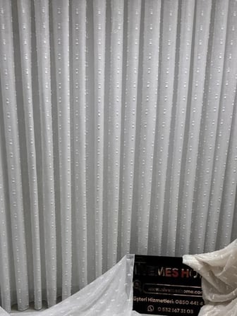 NİVEMESHOME FLORİDA DD1654 V2 KETEN GÖRÜNÜMLÜ GRİ RENKLİ BOHEM TARZ PONPON 1/3 SIK PİLELİ TÜL PERDE