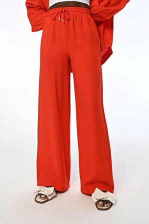 KADIN RAHAT KALIP BOL PAÇA BELİ LASTİKLİ DÜZ RENK PANTOLON