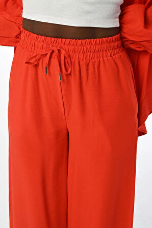 KADIN RAHAT KALIP BOL PAÇA BELİ LASTİKLİ DÜZ RENK PANTOLON