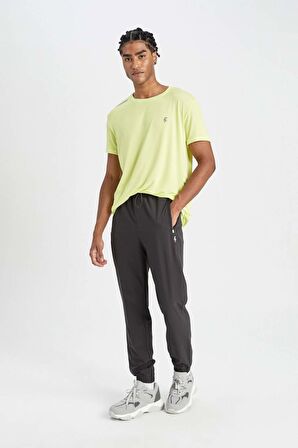 DeFactoFit Sporcu Jogger Eşofman Altı Standart Fit Çift Cepli Dokuma Beli Paçası Lastikli B5147AX24SPAR231