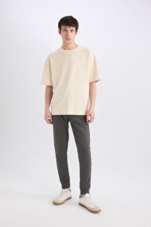 DeFacto Jogger Eşofman Altı Slim Fit Dar Kesim Beli Bağcıklı Lastikli Paça Fermuar Cepli A4387AX24AUAR227