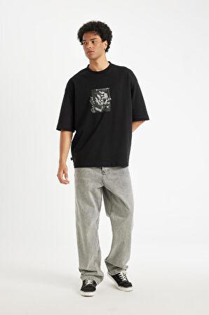 DeFacto Siyah Loose Fit Bisiklet Yaka Çiçek Baskılı Ağır Kumaş Kısa Kollu Tişört C7056AX24AUBK81