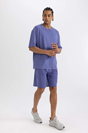 DeFactoFit Slim Fit Dar Kesim Cepli Baskılı Sporcu Şort A1625AX24SMPR484