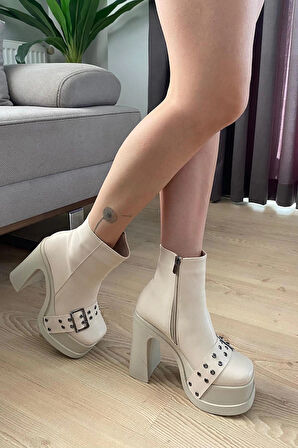 Kadın Sidney Krem Cilt Toka Detaylı 12 cm Platform Topuklu Fermuarlı Bot