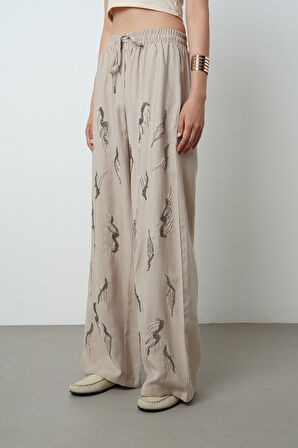 Kadın Önü Taş İşlemeli Düz Renk Beli Lastikli Bol Paça Pantolon