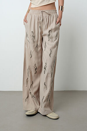 Kadın Önü Taş İşlemeli Düz Renk Beli Lastikli Bol Paça Pantolon