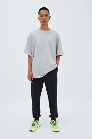 Erkek Siyah Arka Cep Etiket Detaylı Paça Lastikli Regular Fit Eşofman Altı