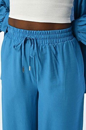 KADIN RAHAT KALIP BOL PAÇA BELİ LASTİKLİ DÜZ RENK PANTOLON