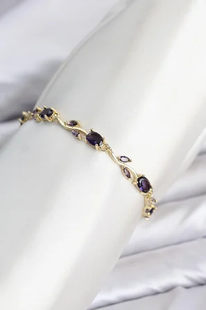 Pirinç Gold Renk Mor Zirkon Taşlı Çiçek Model Kadın Bileklik