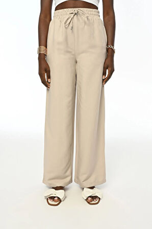 BELİ LASATİKLİ RAHAT KALIP BOL PAÇA PANTOLON