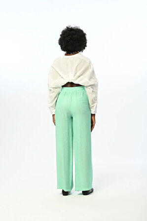 KADIN BELİ LASTİKLİ BOL PAÇA İNCE ÇİZGİLİ DÜZ RENK PANTOLON