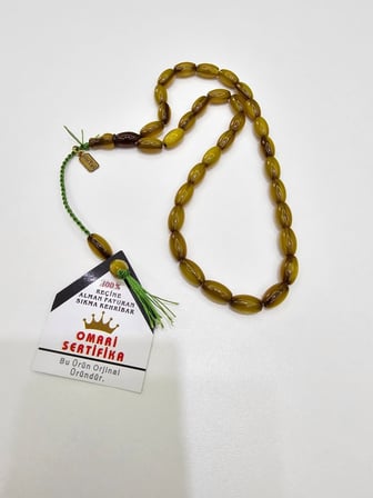 Omari İmzalı Sertifikalı Alman Faturan Sıkma Kehribar Tesbih 7x12 mm Arpa Kesim