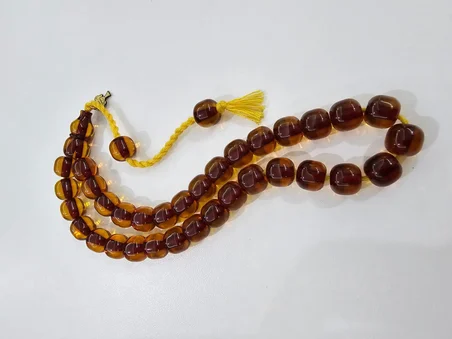 Mehmet Başkut Usta İmzalı Faturan Sıkma Kehribar Tesbih (10×11 mm) Kapsül Kesim